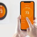 Smart thermostat and mobile app interface showing 73°F, highlighting Jerry Brittingham A/C & Heat's HVAC solutions.